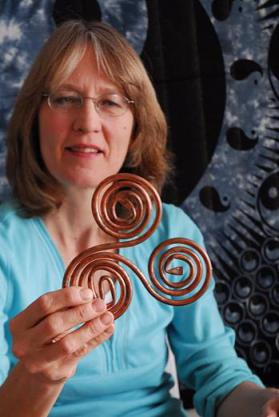 MJ Pangman with a triskelion.